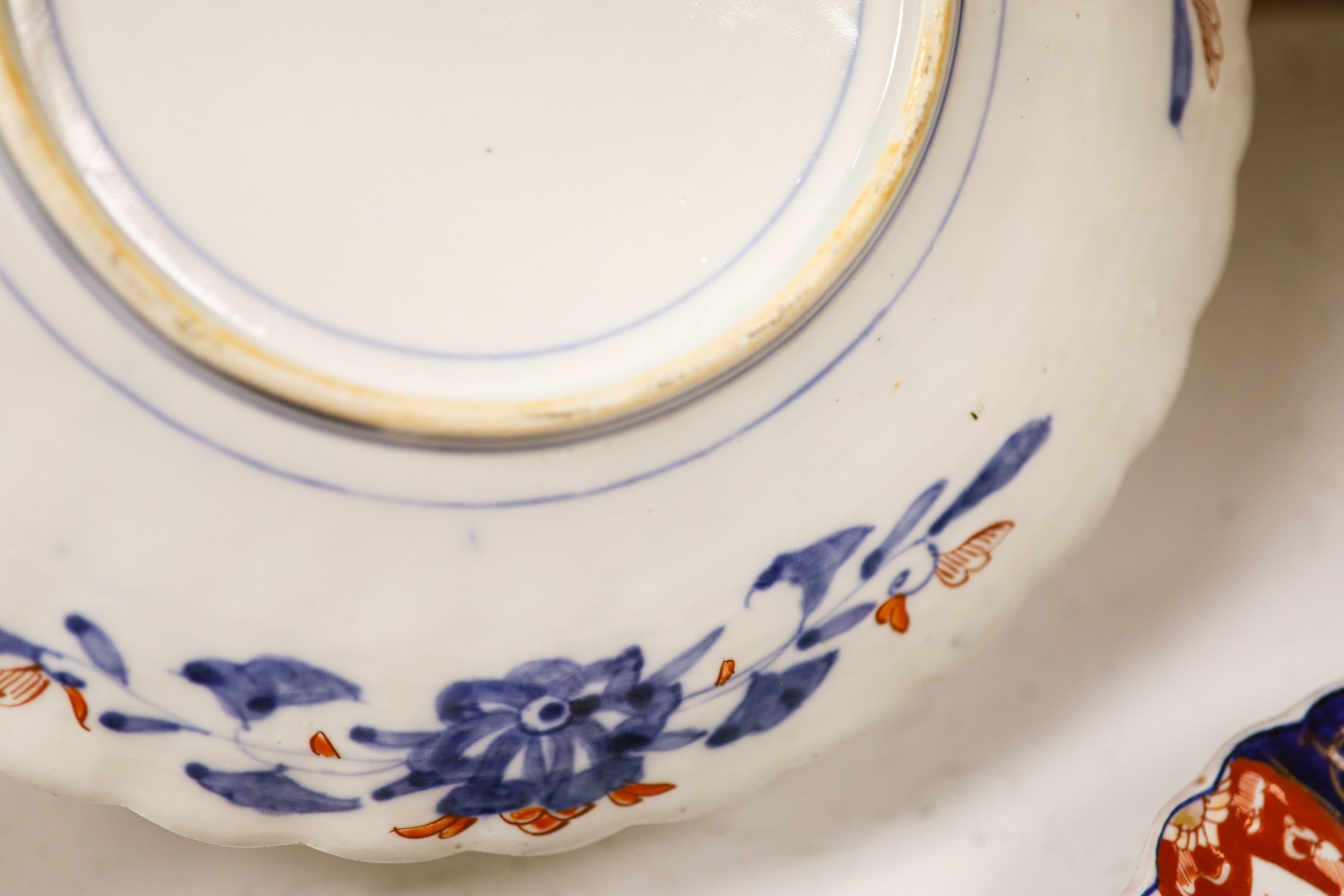 Five Japanese Imari dishes, largest 30.5 cm